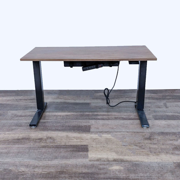Desk with wood finish top, black steel legs, motorized control not working.