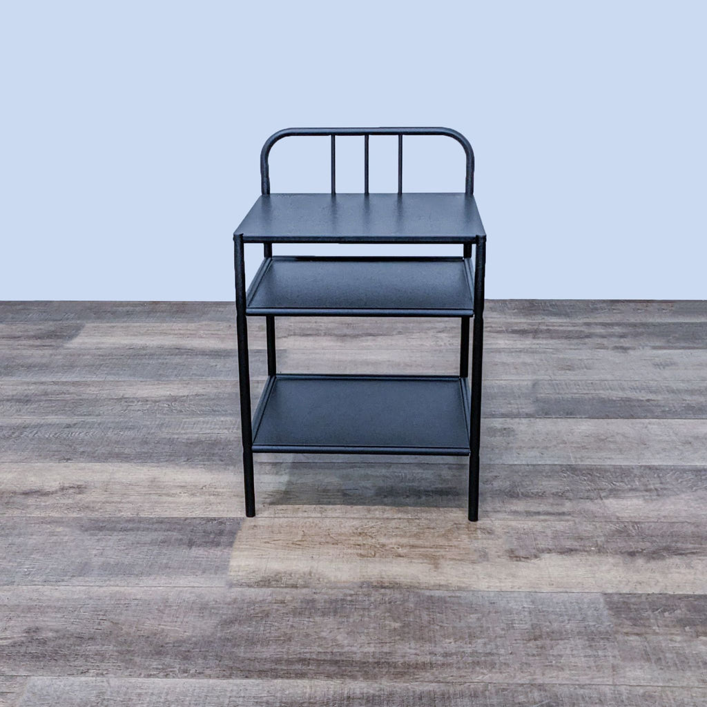 Ikea end table with shelves and a minimalist design. 