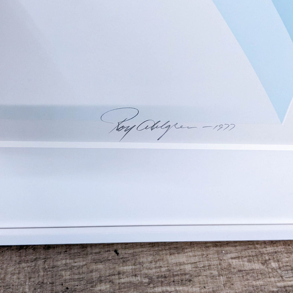 Close-up of Roy Ahlgren's pencil signature and 1977 date on art.