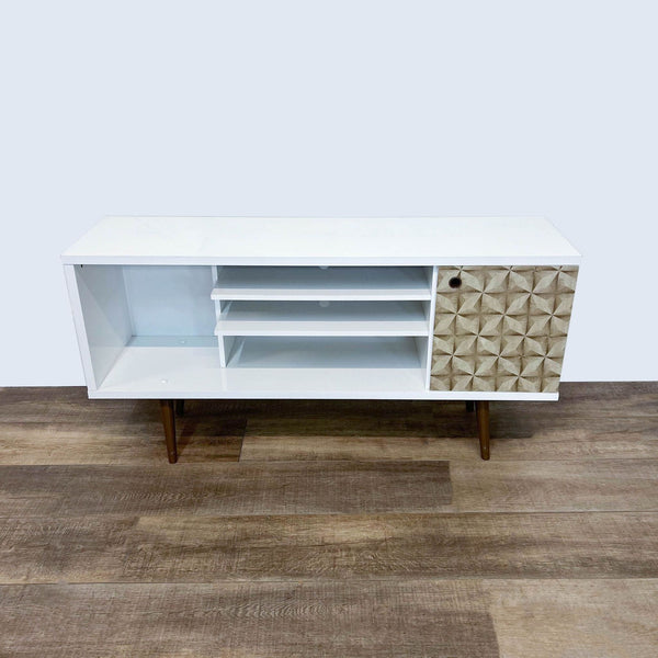 Mid-century style white entertainment center by Reperch with open shelves and geometric door.