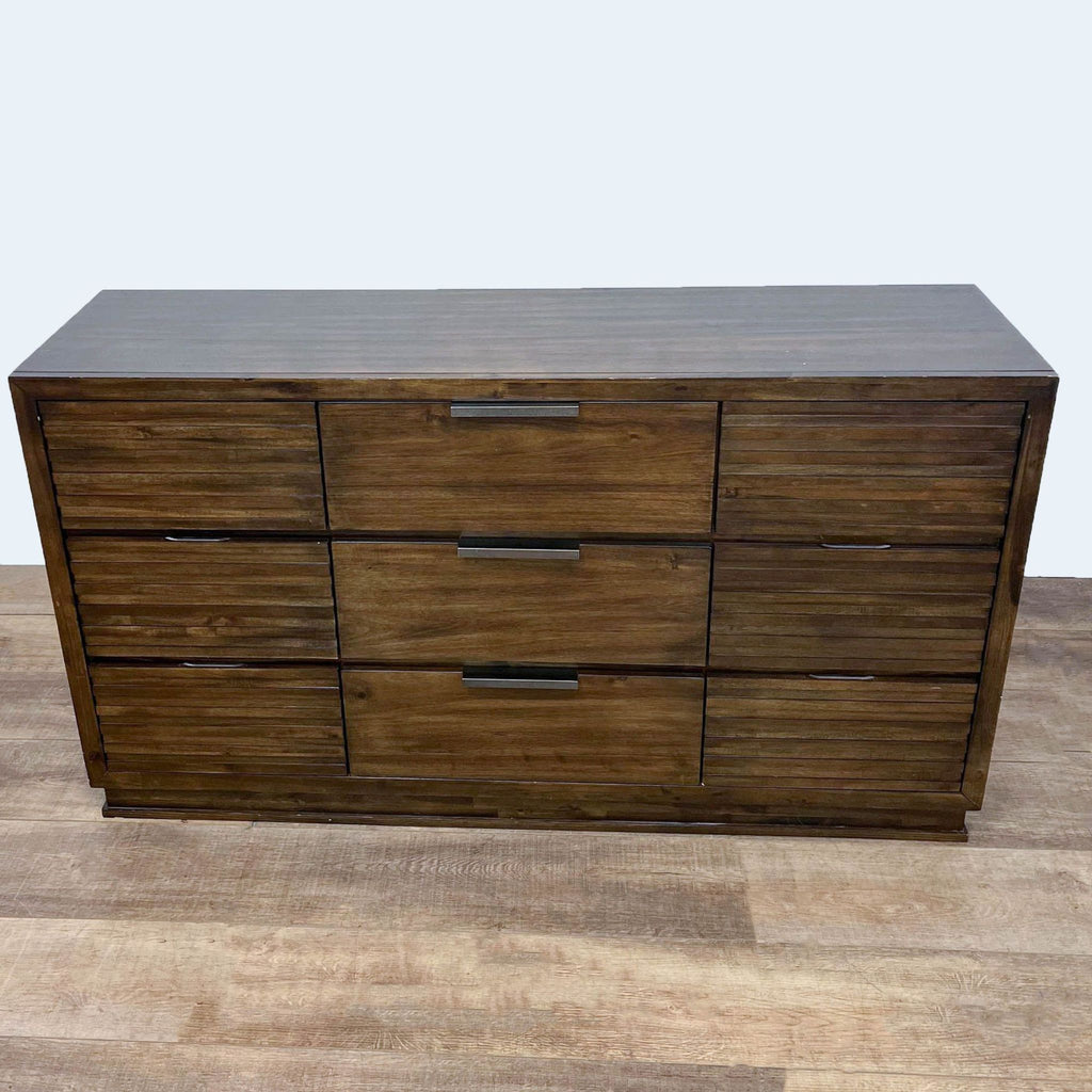 3. Modern dresser featuring a walnut finish and slated drawer fronts.