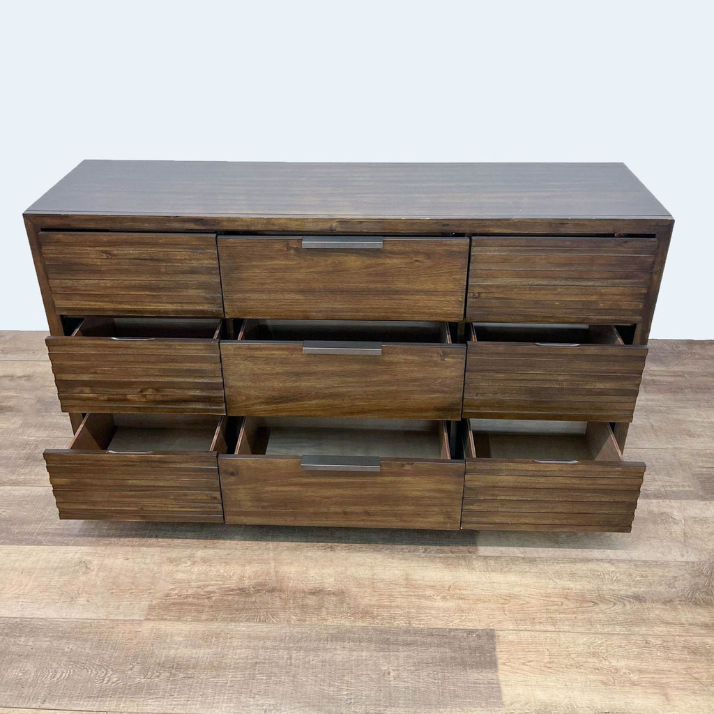 2. Walnut finish dresser by Furniture of America with open drawers.