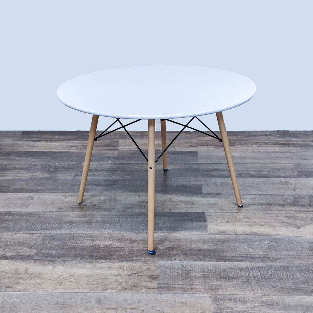 the coffee table is a modern coffee table with a round top and a round top.