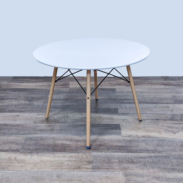 the coffee table is a modern coffee table with a round top and a round top.
