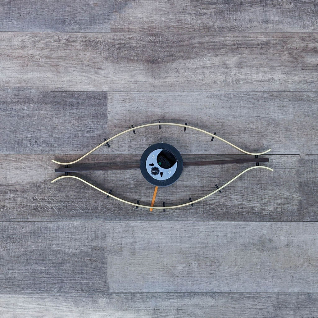 Back view of the Vitra Eye Clock, showcasing the elegant structure and high-quality craftsmanship.