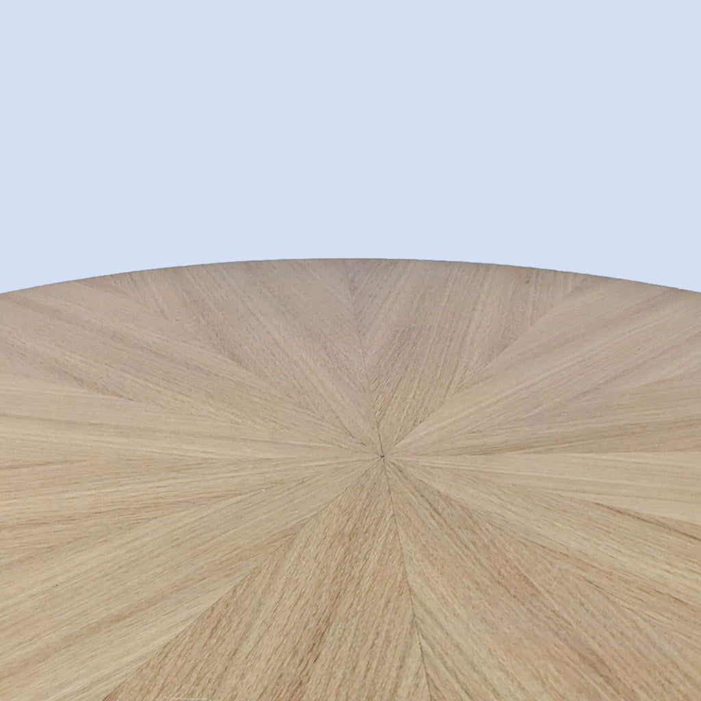 Detailed view of the mid-century sunburst design on the Reperch table.