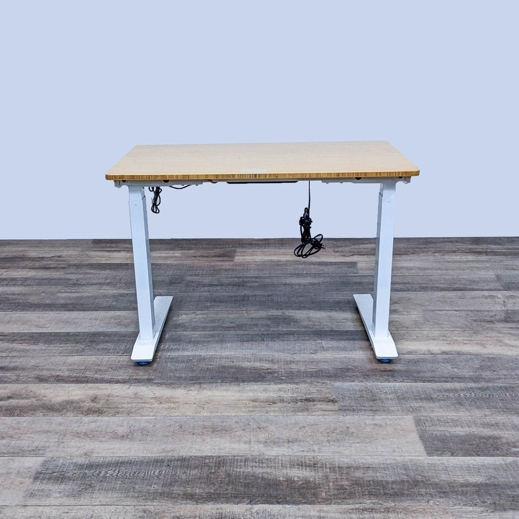 Motorized bamboo desk with white steel frame and height adjustments.  