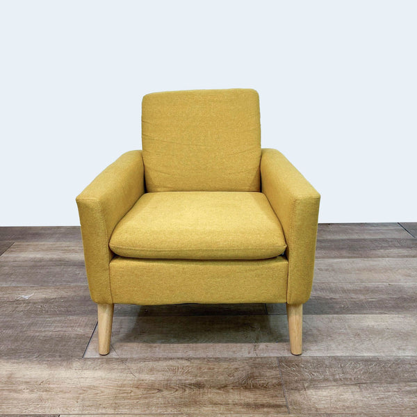 Yellow fabric lounge chair, sponge cushion, wood frame, tapered legs.