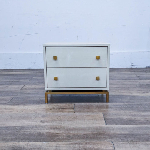 Nightstand with faux shagreen finish, brass frame, and two drawers with brass knobs.