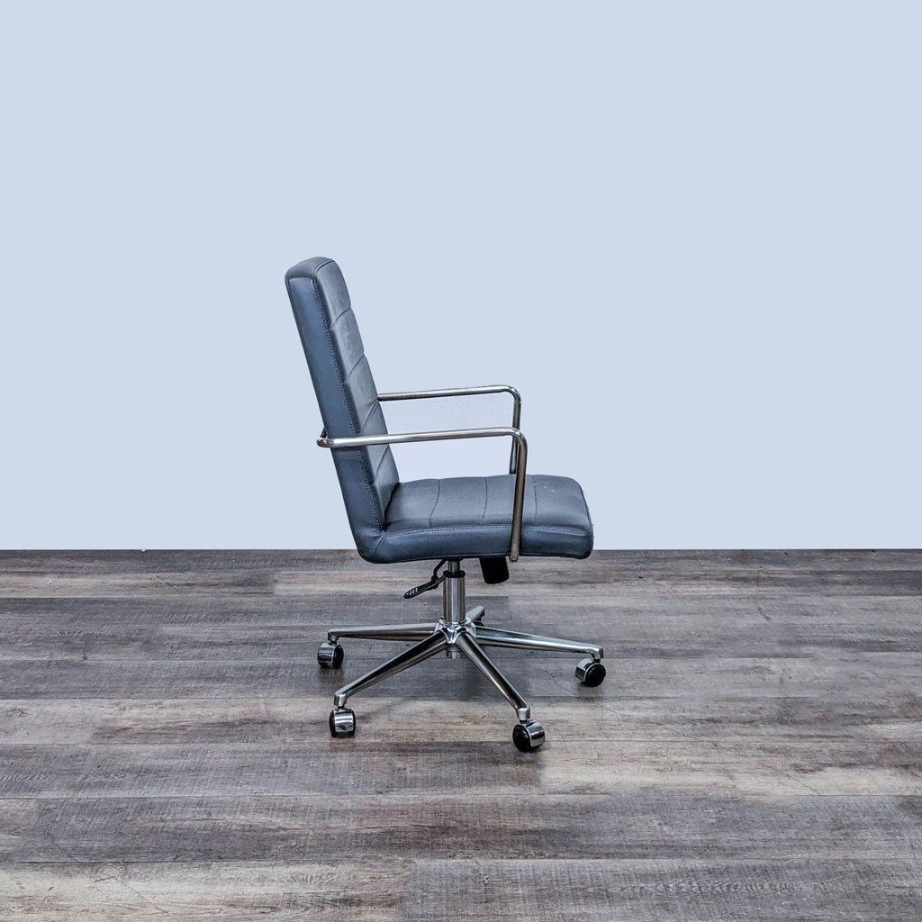 Side profile of Modway's Finesse Chair featuring chrome steel armrests and a polished aluminum base.