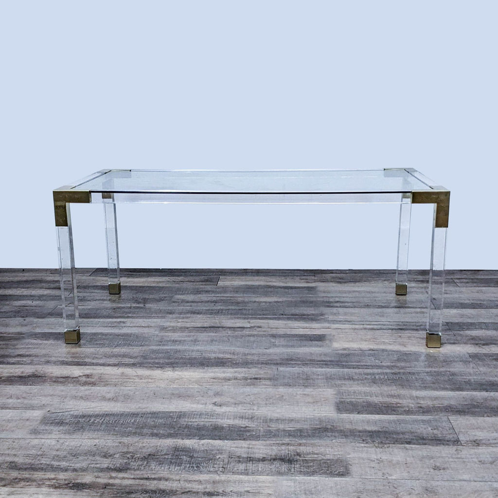 1. Jonathan Adler Jacques dining table with clear acrylic and brushed brass corners, modern and elegant style.  