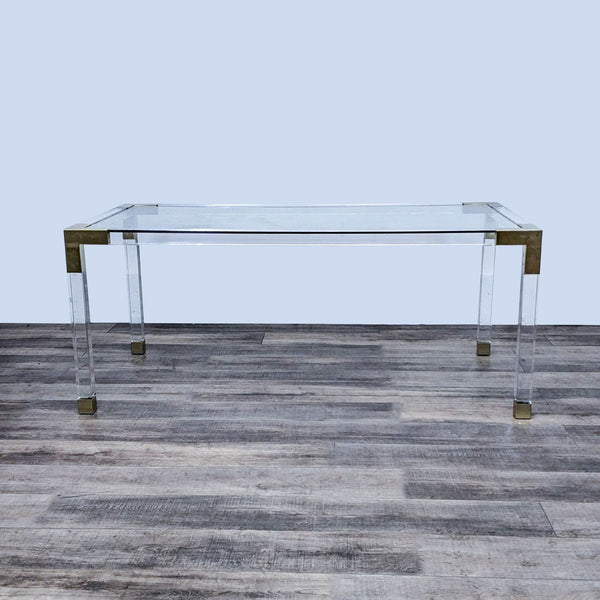 1. Jonathan Adler Jacques dining table with clear acrylic and brushed brass corners, modern and elegant style.  