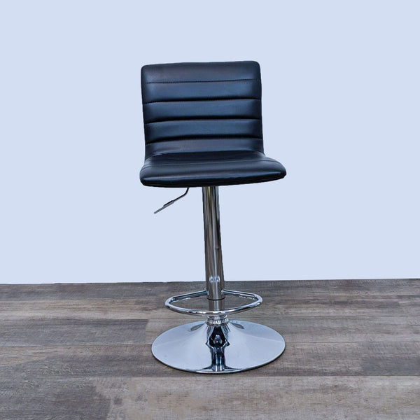 Reperch black leather-look swivel stool with chrome frame and adjustable height settings.