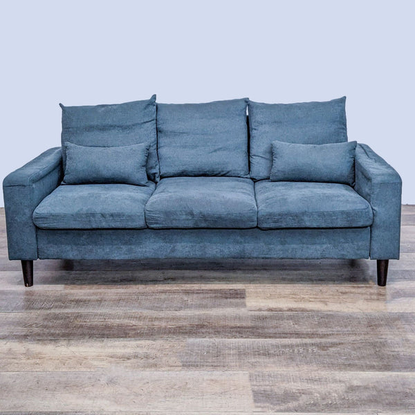 Front view of a 3-seat sofa with dark finish feet and two accent pillows.