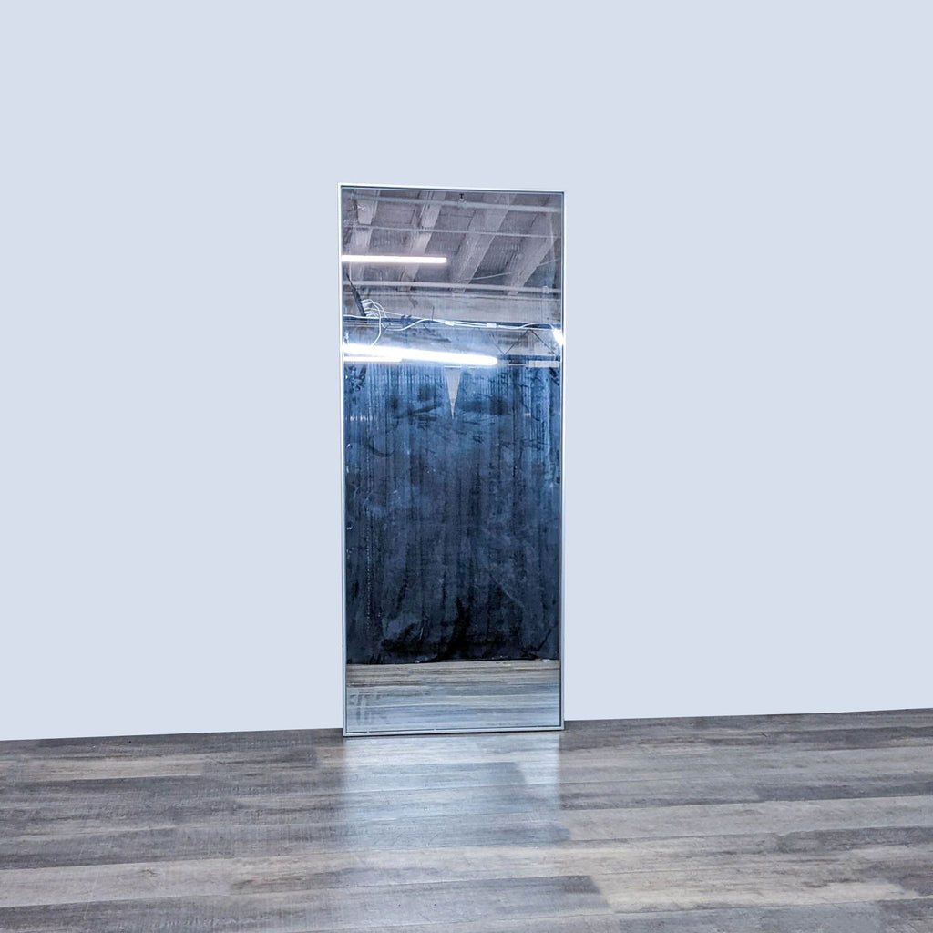 West Elm full-length mirror with stainless steel frame.