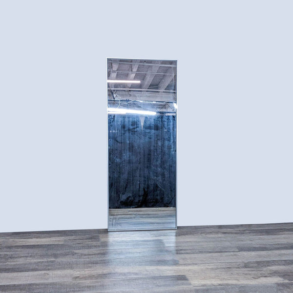 West Elm full-length mirror with stainless steel frame.