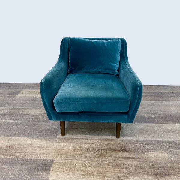 1. Front view of Article's Matrix lounge chair with blue cotton velvet upholstery and wooden legs.