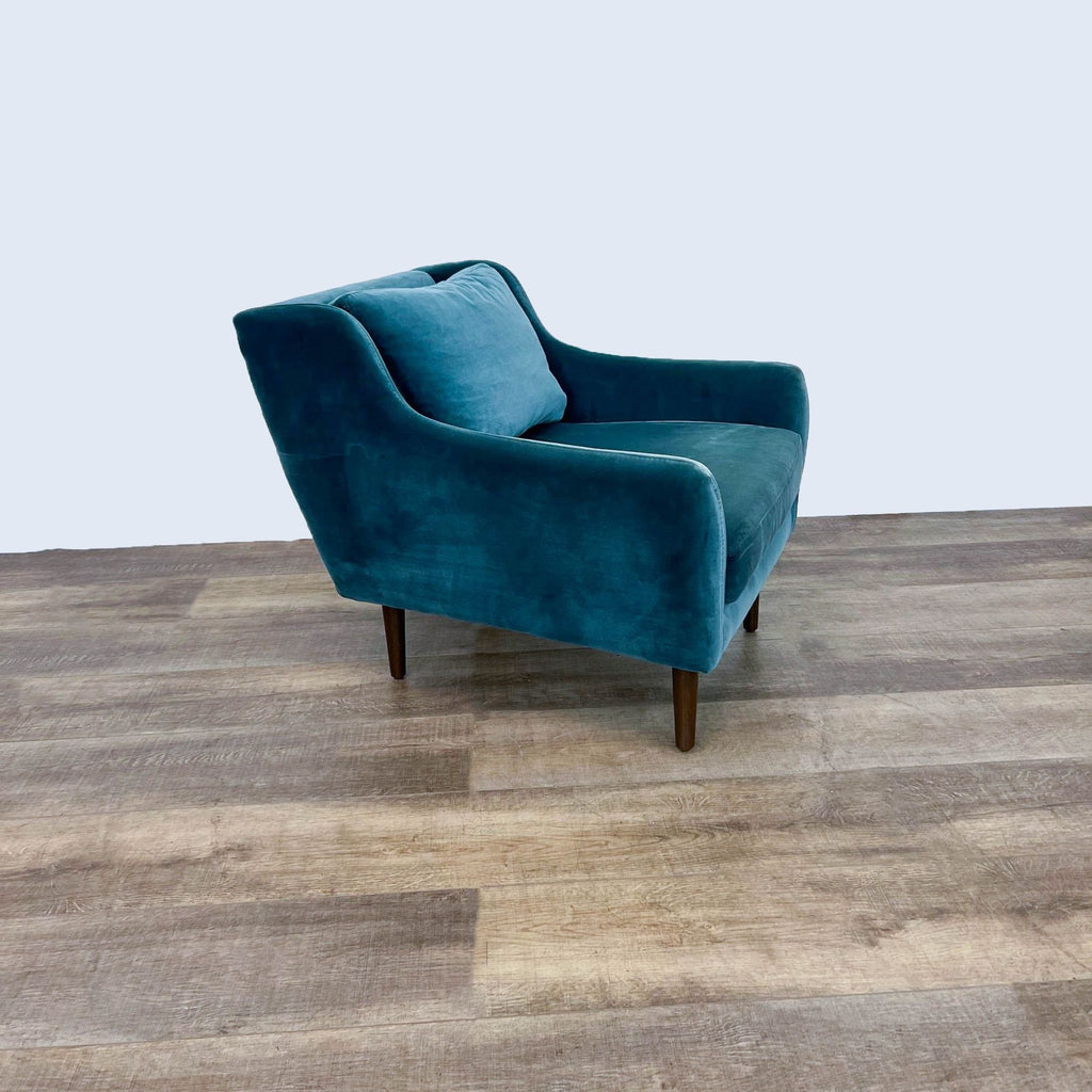 2. Angled side view of Article Matrix lounge chair showcasing plush cotton velvet and modern wood legs.