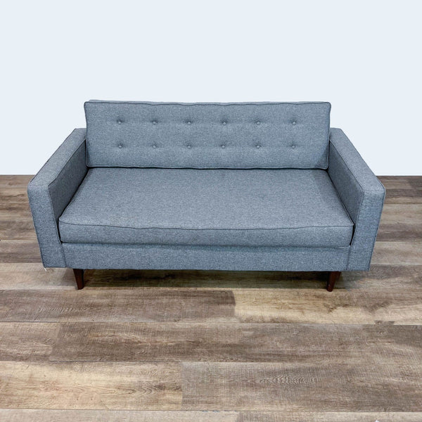 Gray Reperch 3-seat sofa with button tufted back and narrow arms.