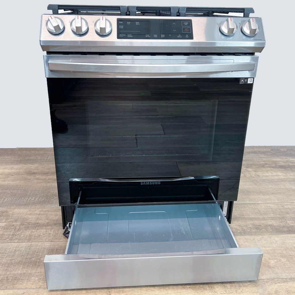 Samsung stove featuring a bottom drawer, controls, and sleek front design.