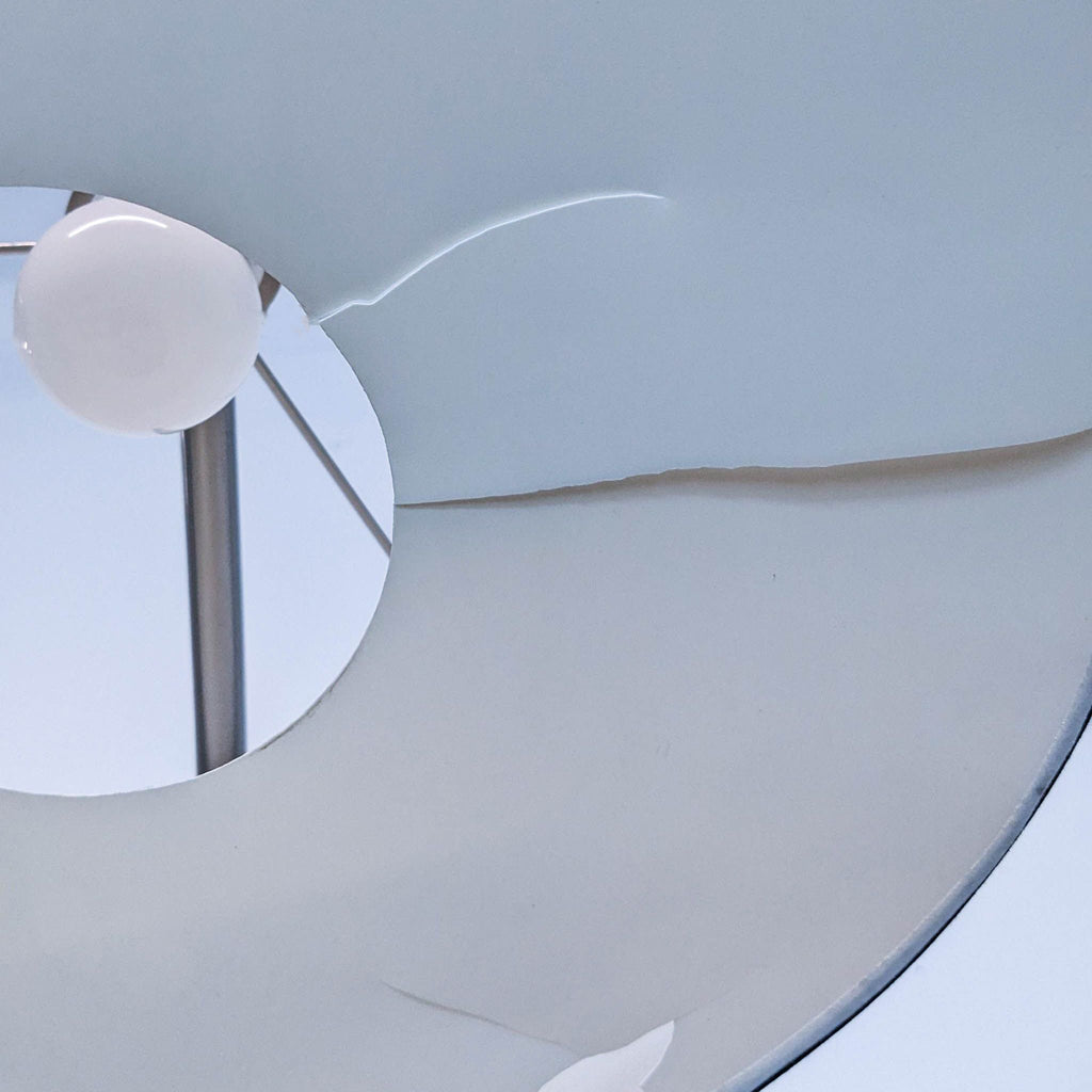 Detailed view of the Reperch lamp's light bulb and inner shade.