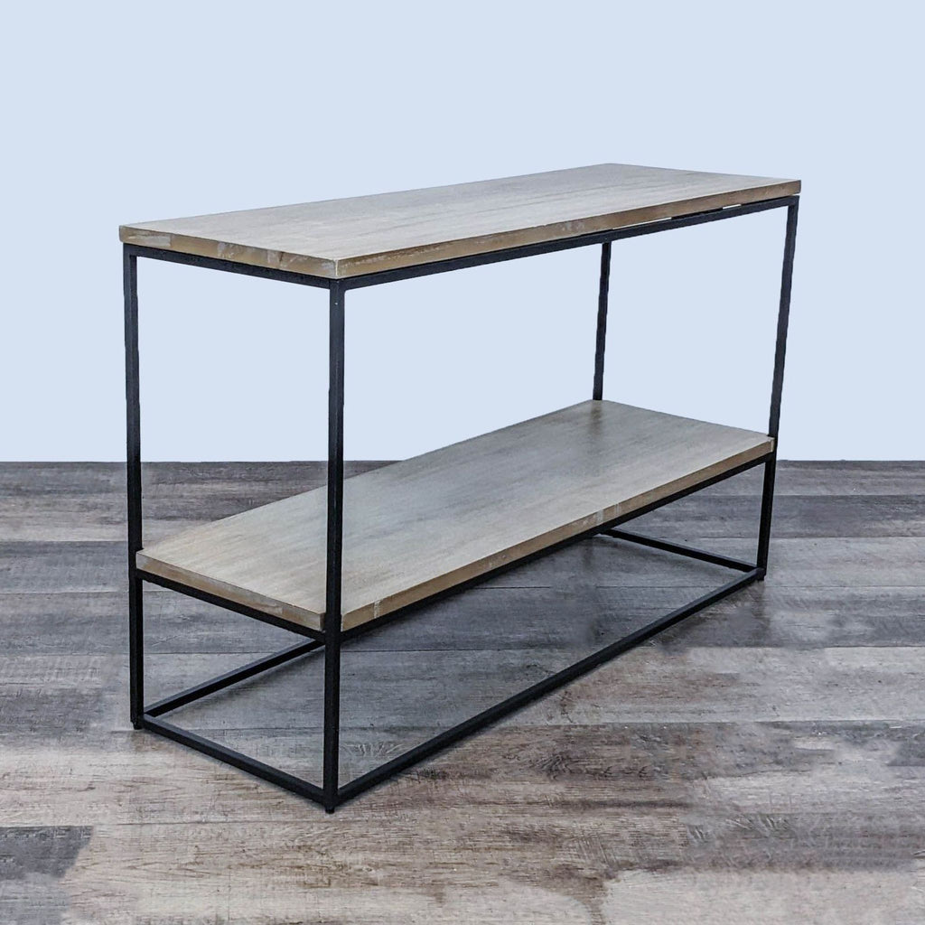 Modern two-tier metal and wood bookshelf from West Elm.