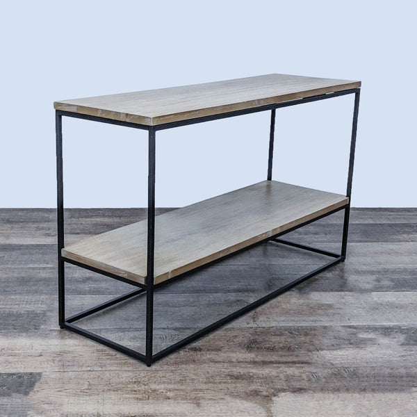 Modern two-tier metal and wood bookshelf from West Elm.