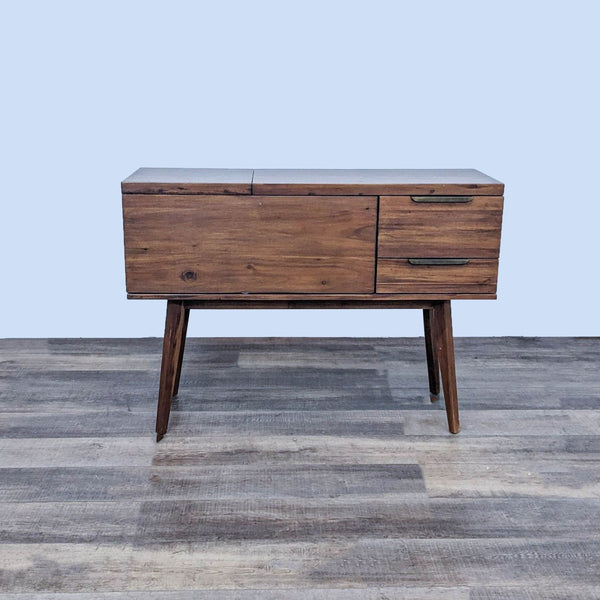 Reperch wooden sideboard with closed storage and angled legs.