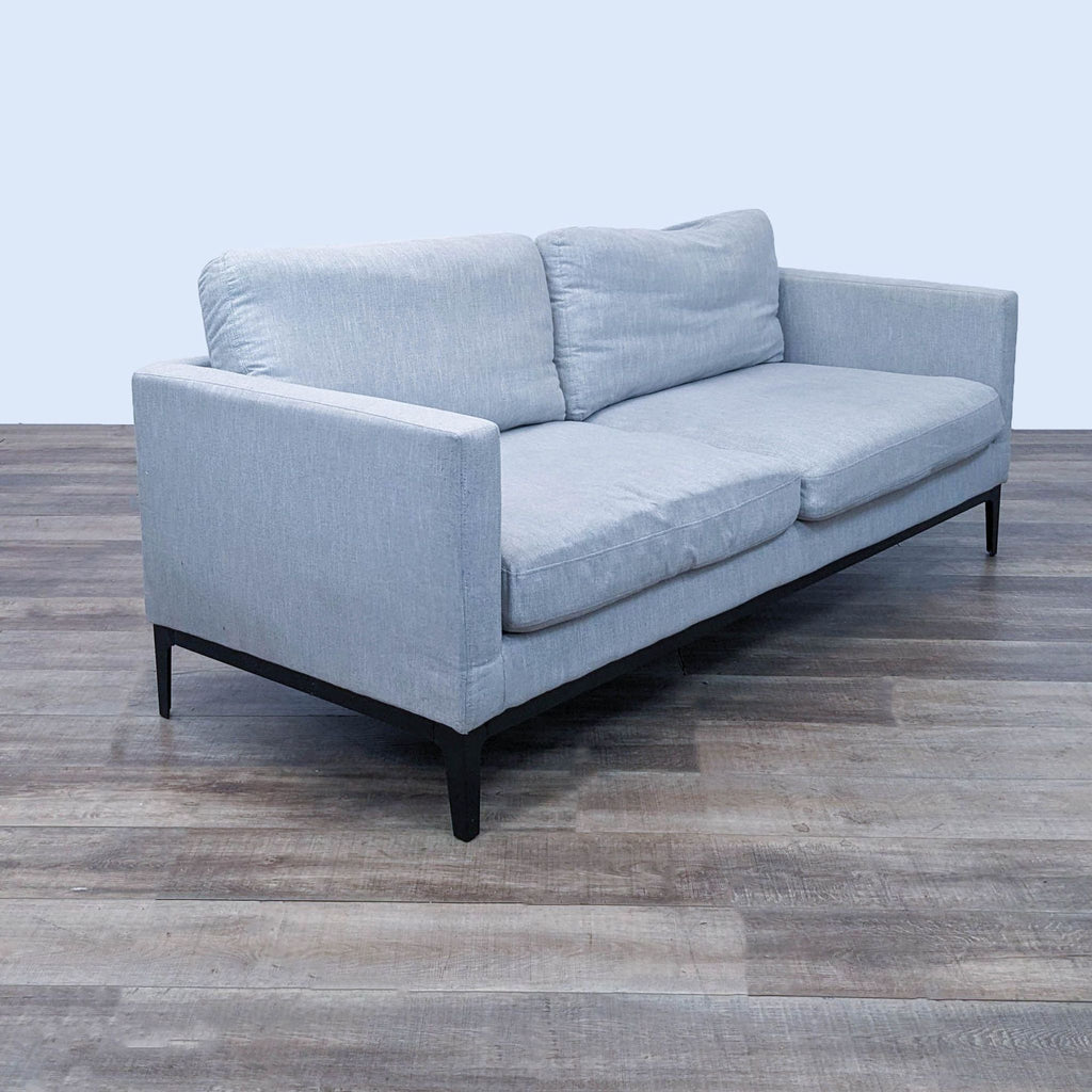 Side view of a clean line gray Coaster 3-seat sofa with sleek design.