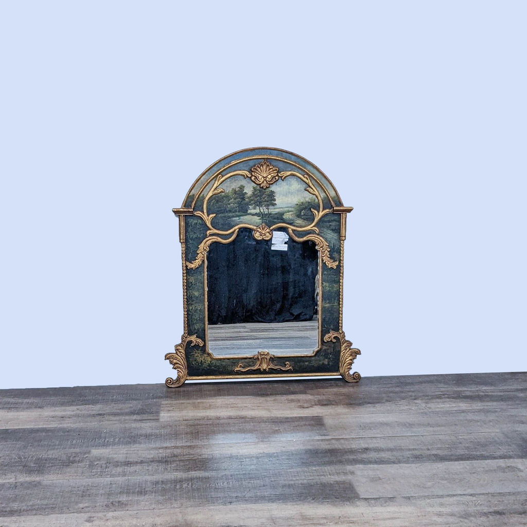 Rococo style mirror with gilt wood accents, featuring landscape scenery around the glass.