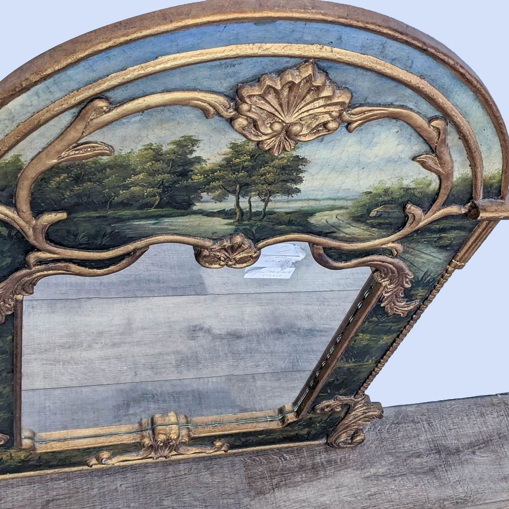 Close-up of Rococo mirror's carved details and hand-painted landscape on the frame.