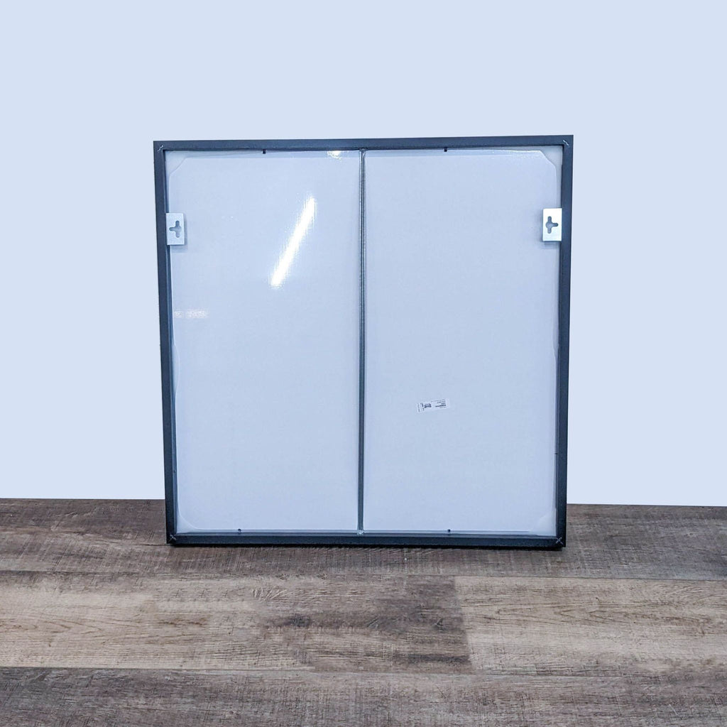 Back view of the mirror displaying mounting hardware.