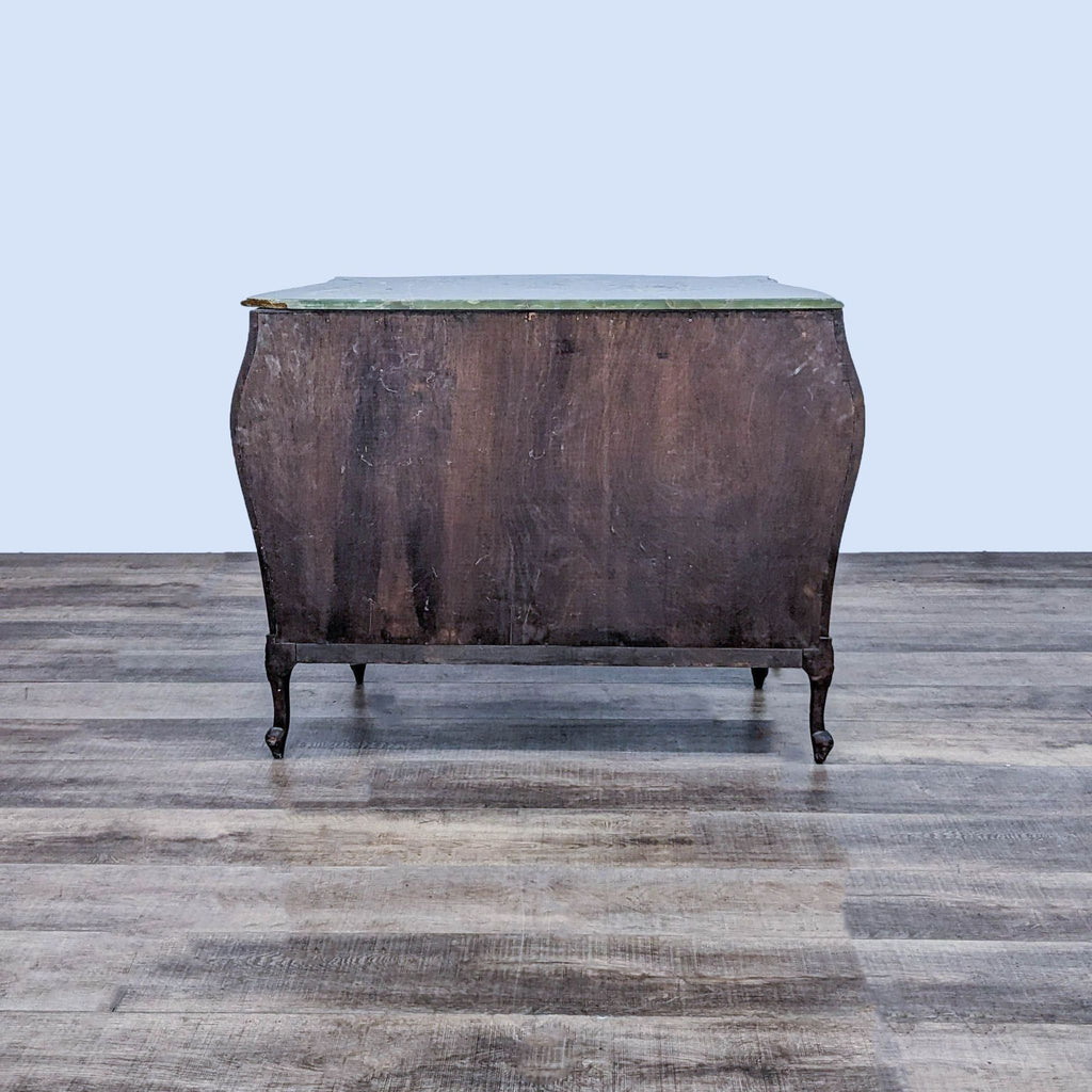 Back view of Reperch Louis XV chest showing wood finish details.