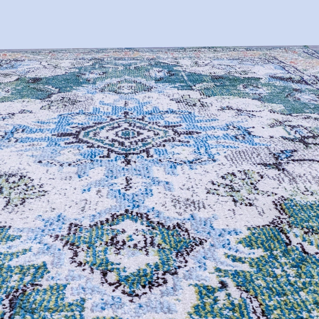 Close-up of the Safavieh Monaco rug’s intricate floral design.