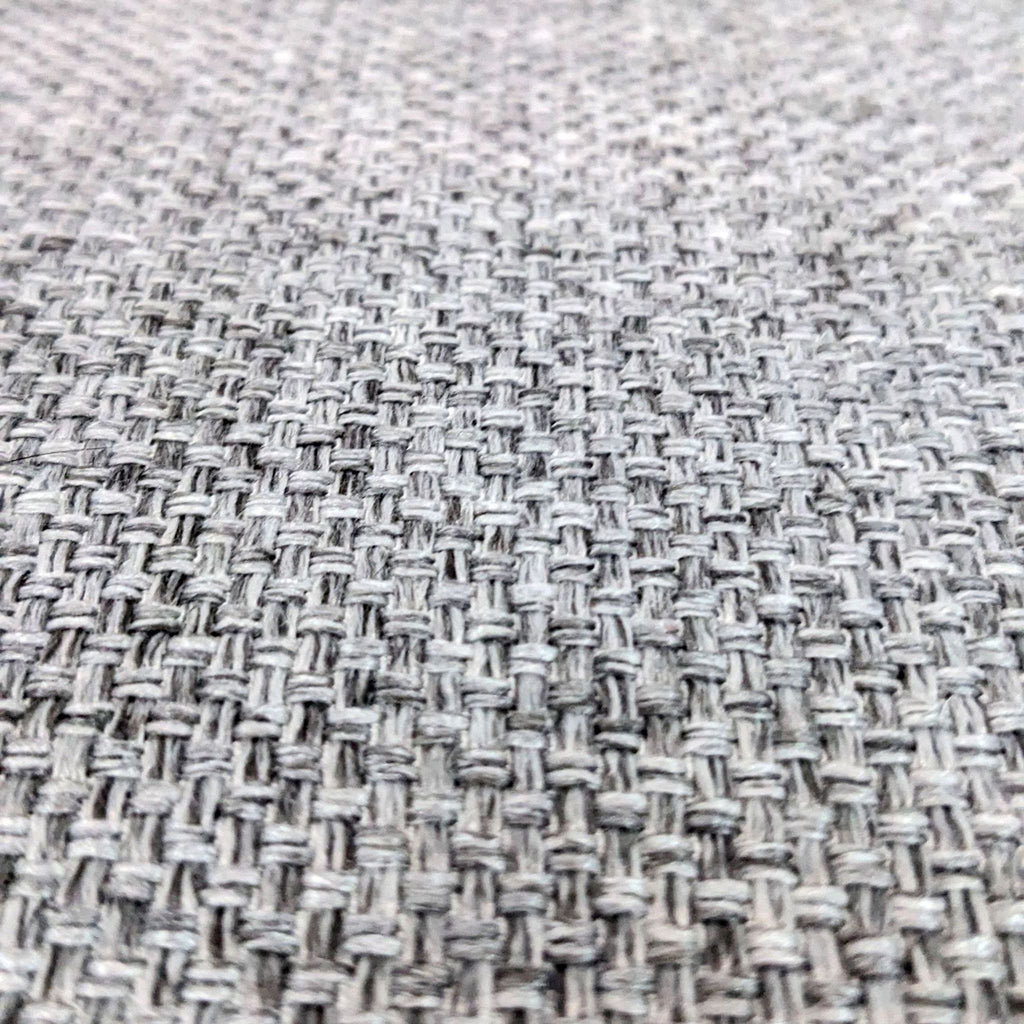 Close-up of the Marlow chair's textured grey fabric from Four Hands Lounge.