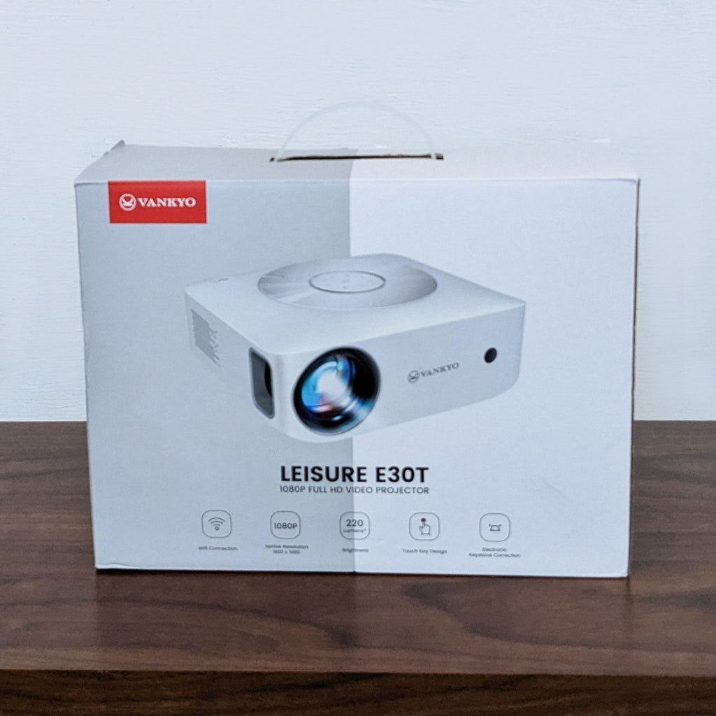 Vankyo projector box on a wooden table, featuring the Leisure E30T model.