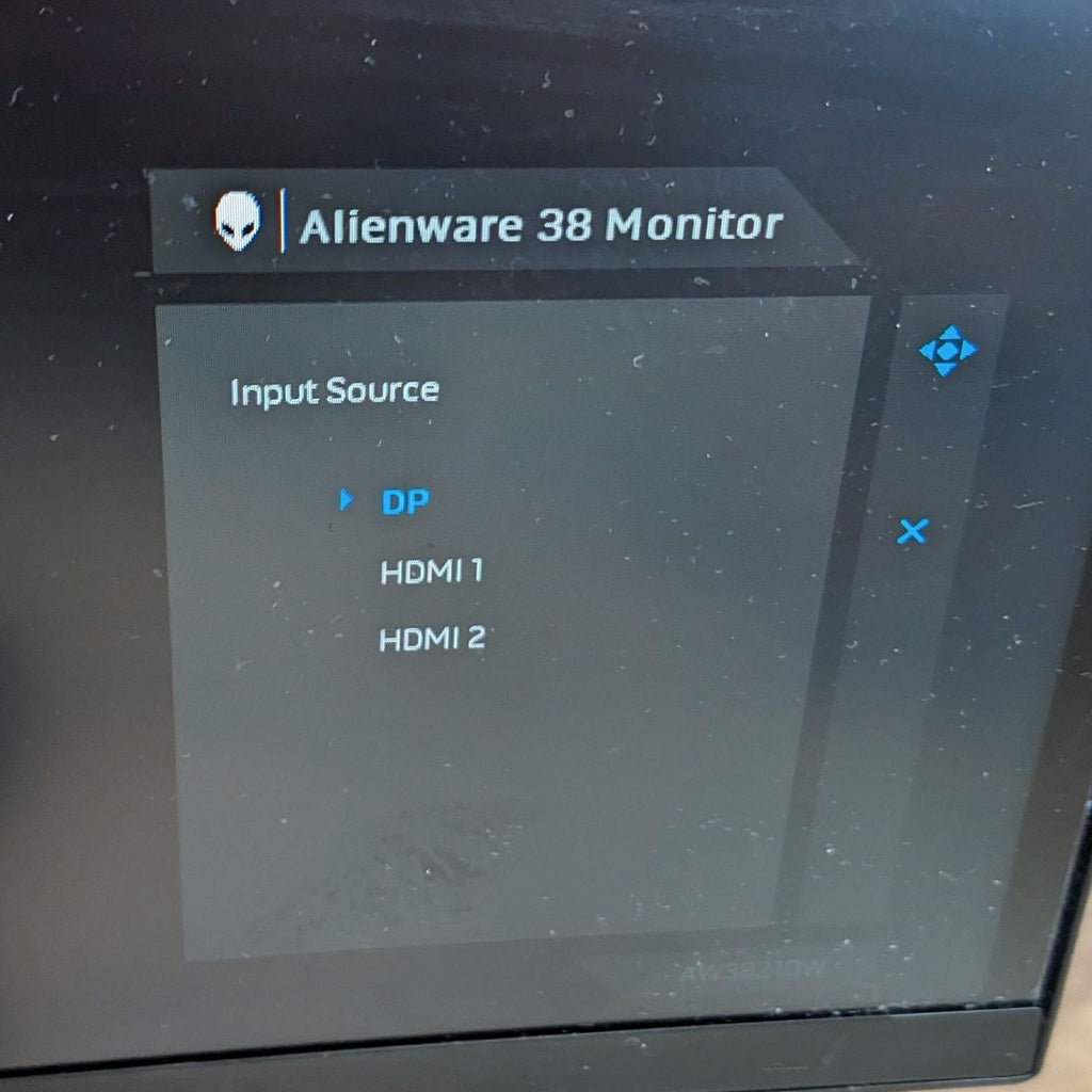 Close-up of Alienware monitor menu displaying input source options.