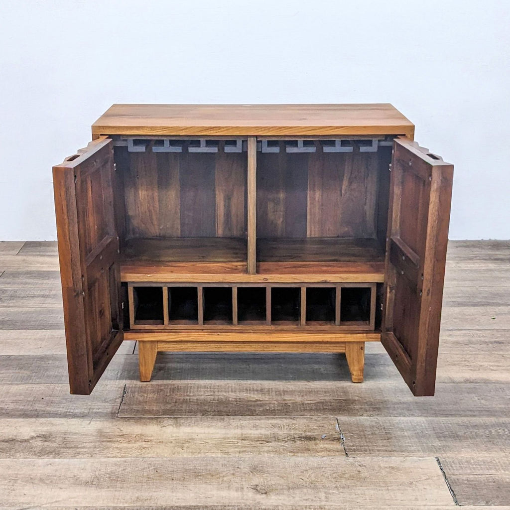 Open bar cabinet showing wine racks and shelves inside, crafted from reclaimed teak wood.