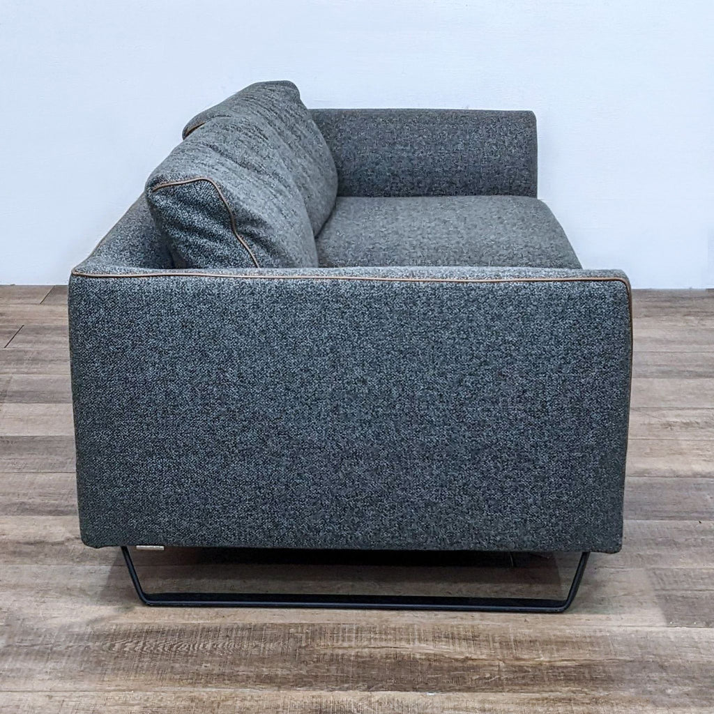 Ersa Mobilya 3-seat sofa featuring subtle leather piping and sturdy metal legs.