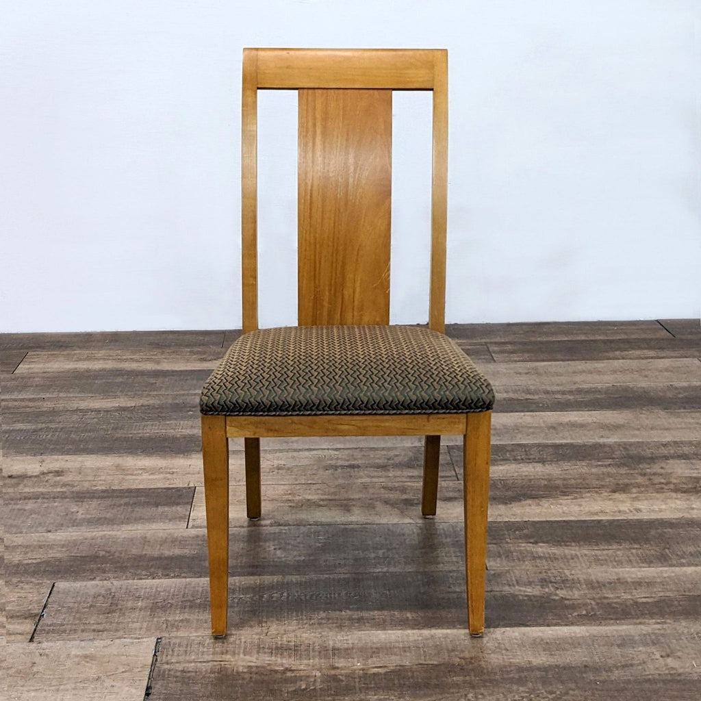 Ethan Allen dining chair with wood frame and modern cushioned seat design.  