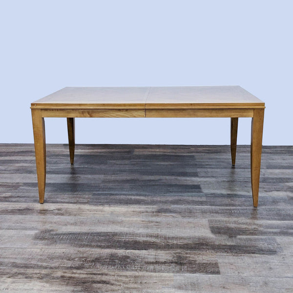 Ethan Allen dining table with herringbone pattern and tapered legs. 