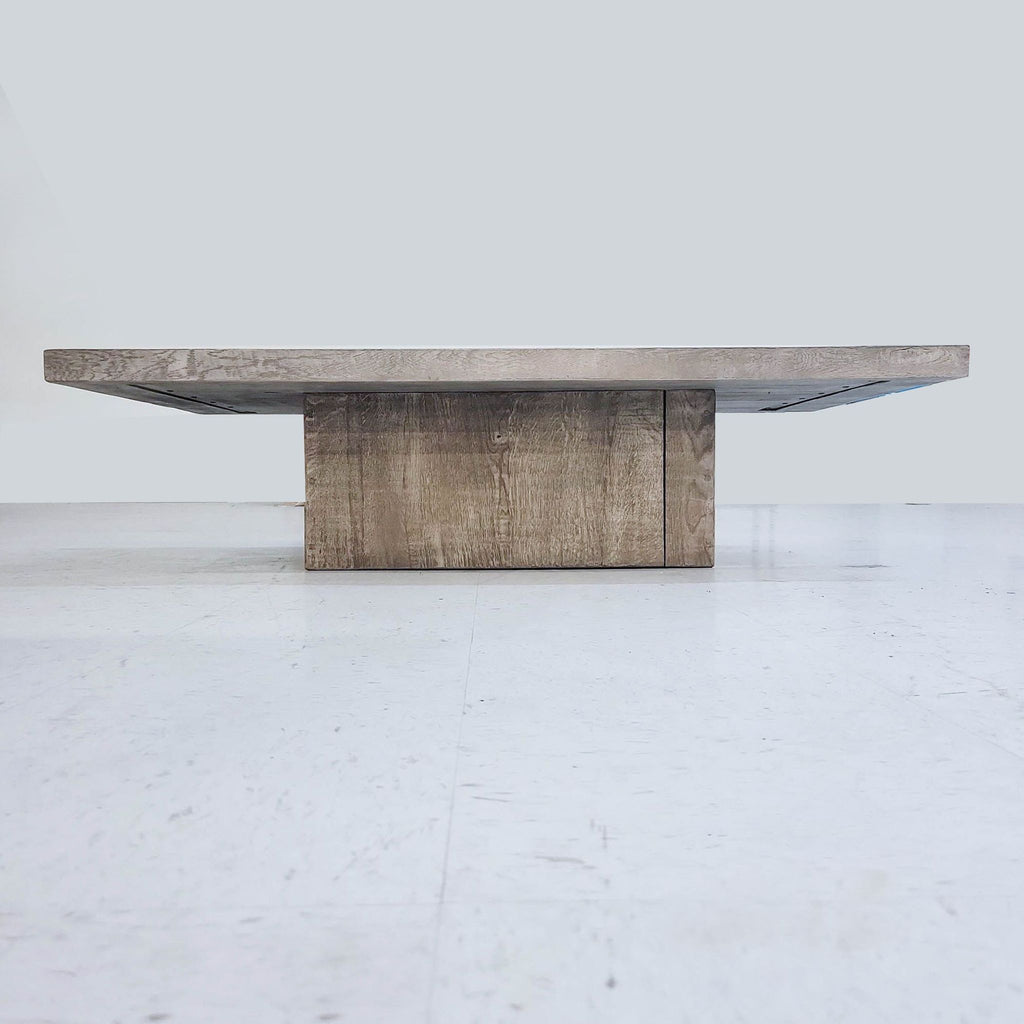 Reclaimed oak coffee table by Theo Eichholtz for Restoration Hardware, showcasing aged wood character.