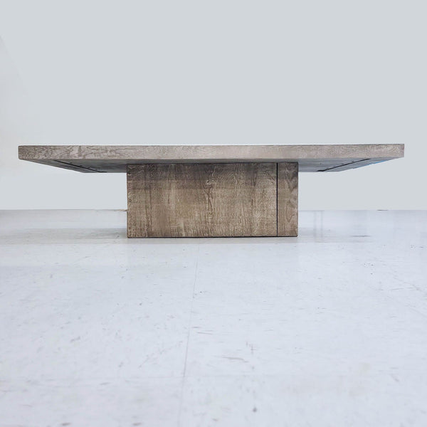 Reclaimed oak coffee table by Theo Eichholtz for Restoration Hardware, showcasing aged wood character.