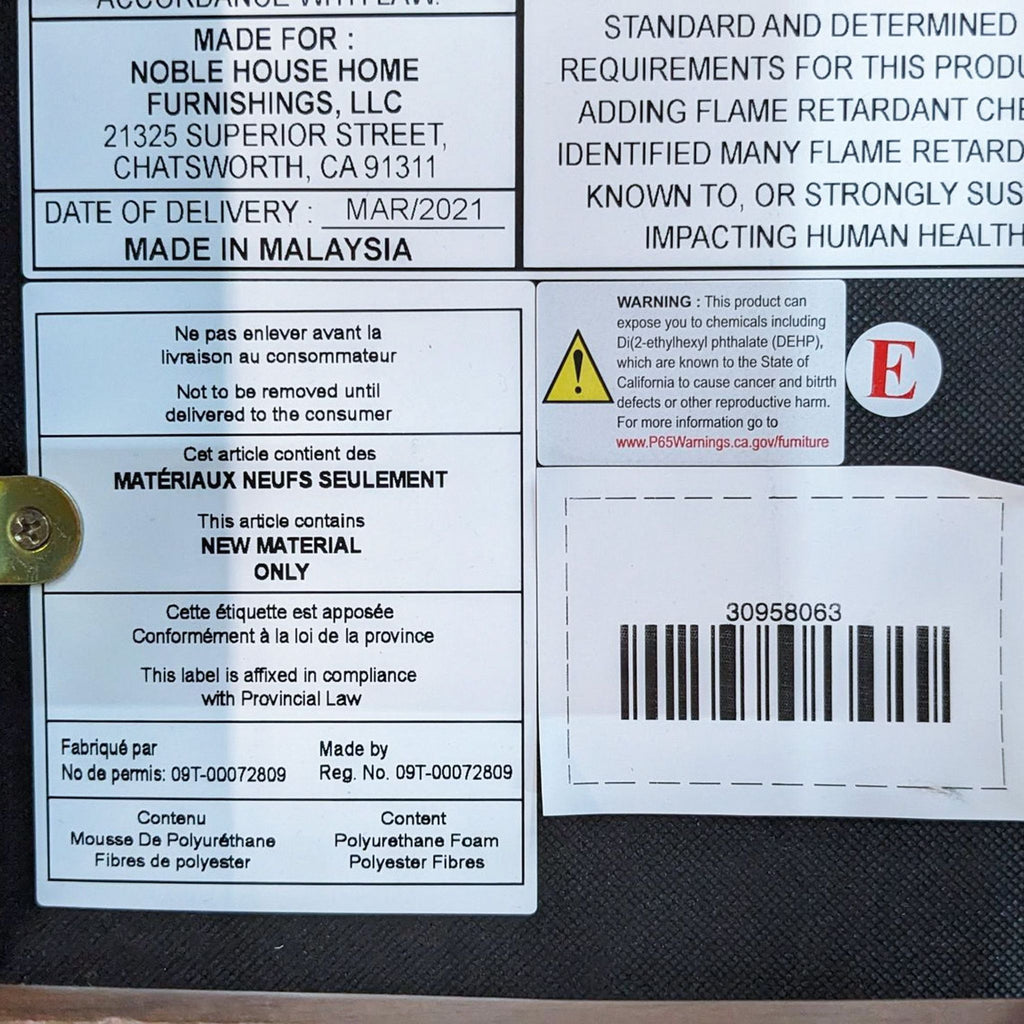 Label showing manufacturing and safety info, "Made in Malaysia."