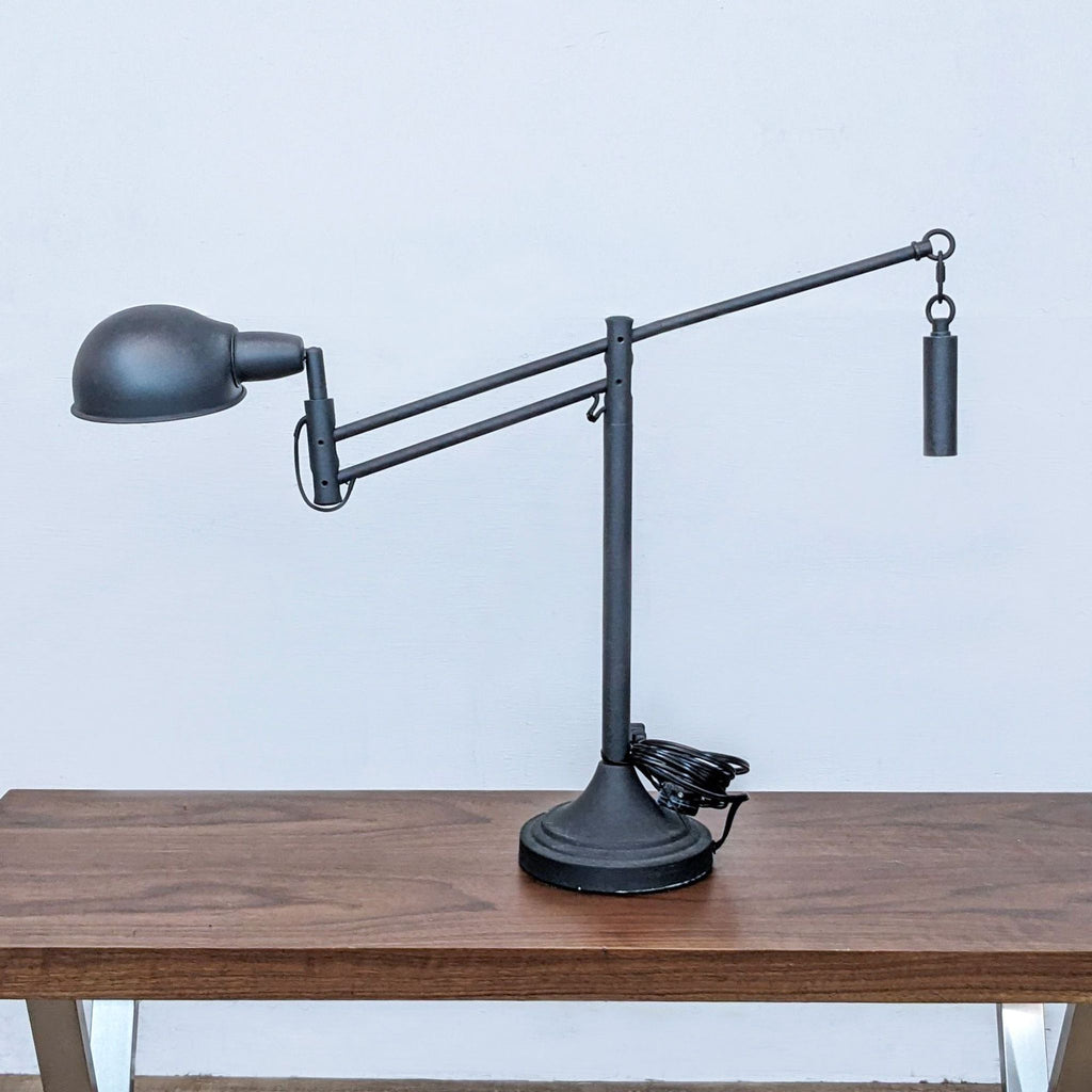 Elegant Reperch desk lamp featuring a counterbalance design.