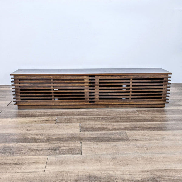 Scandinavian-style walnut TV stand with slim fir wood strips and front door.