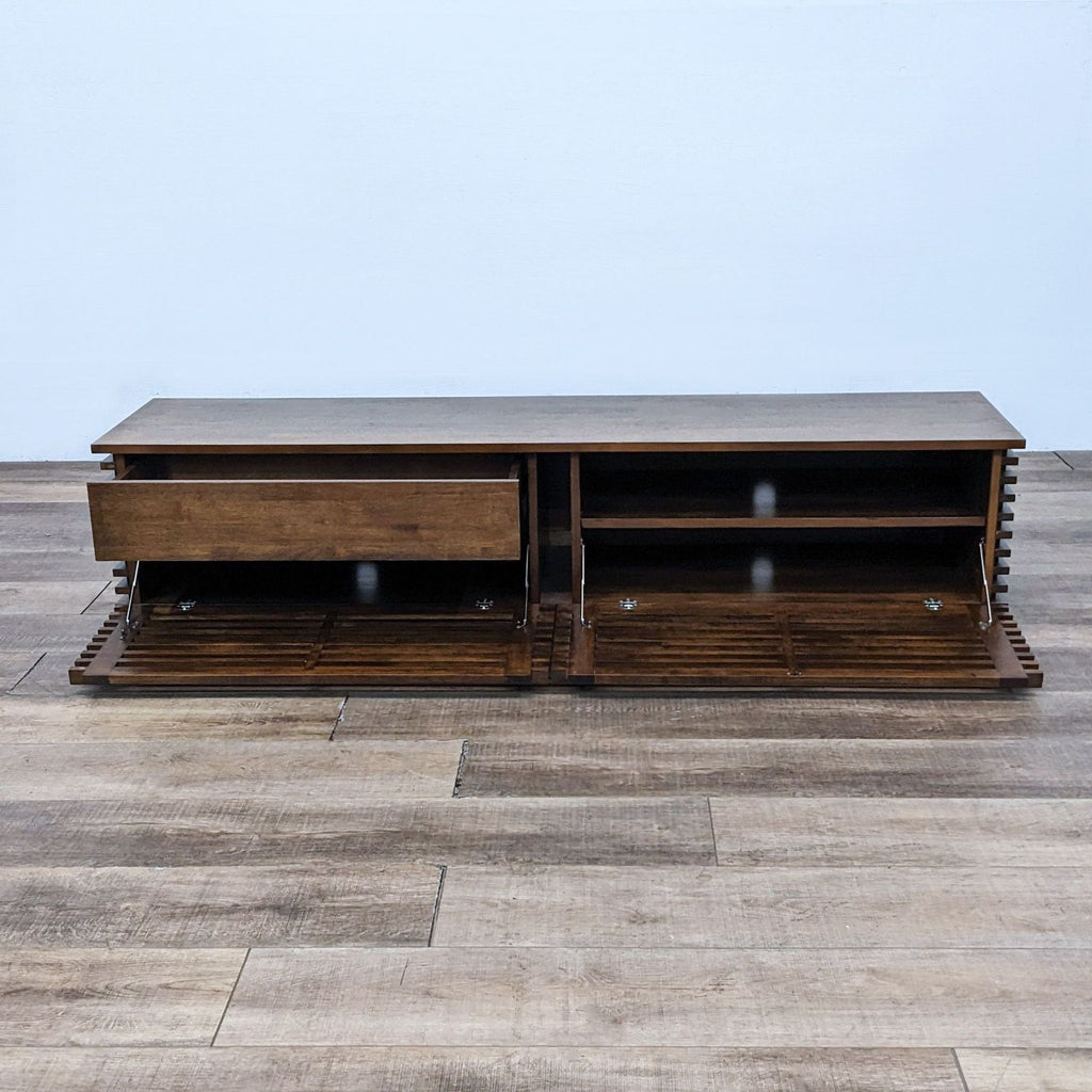 Linea TV stand with adjustable shelves and component holes, in rich walnut finish.