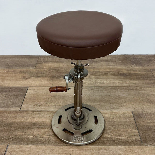 1. Brown leather cushion crank stool with metal base, marked 1765 and AJ, from Reperch.