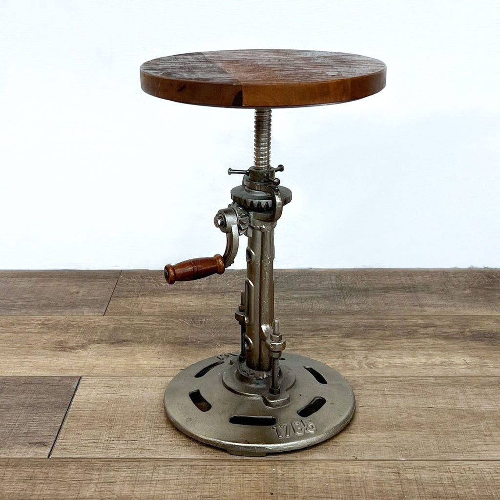 3. Round leather cushion stool on a metal frame with markings 1765 AJ; brand: Reperch.