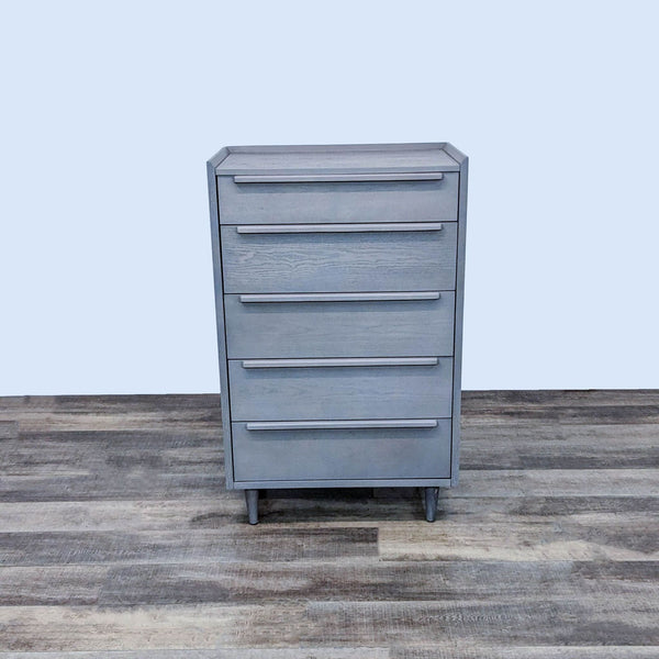 Crate & Barrel chest with five drawers in light stone finish, mid-century design.
